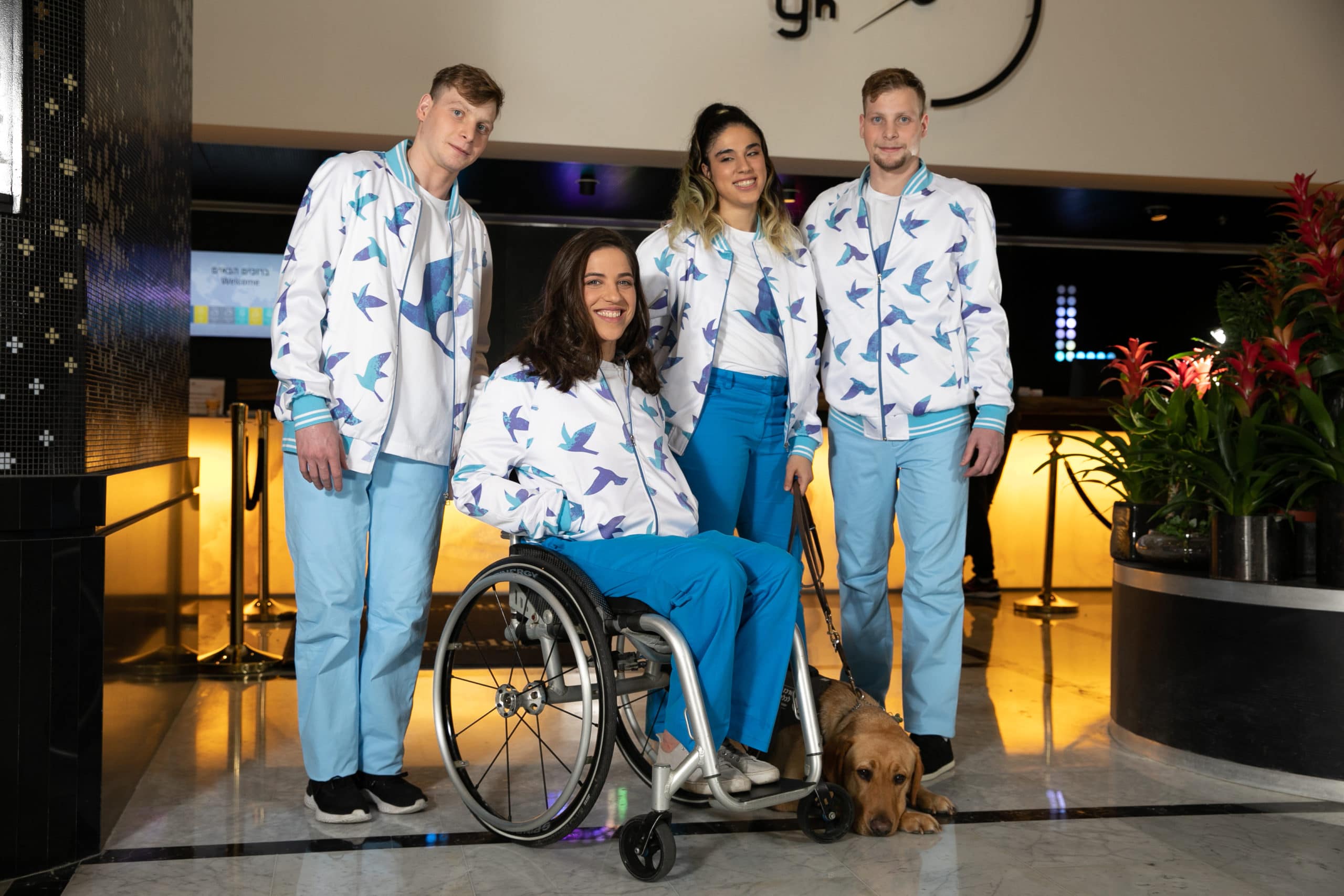 Israeli Paralympic athletes wearing Palta birds white and blue outfit. From left to right- Arik Maliar, Inbal Pezaro, Roni Ohayon and Mark Maliar.